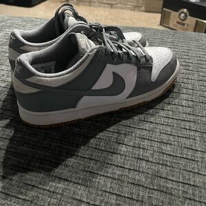 Kids Gray and White Nike Dunks Low size 7Y